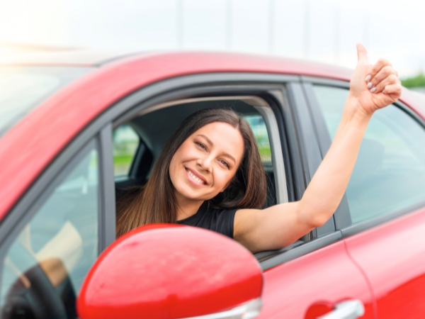 Woman Driving a Car