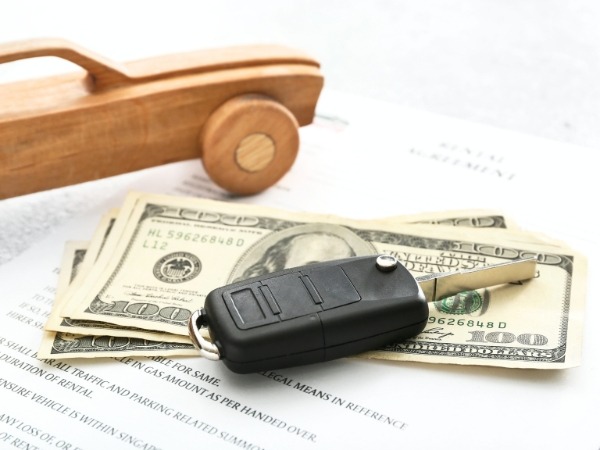 Car Key, Money, and Rental Agreement