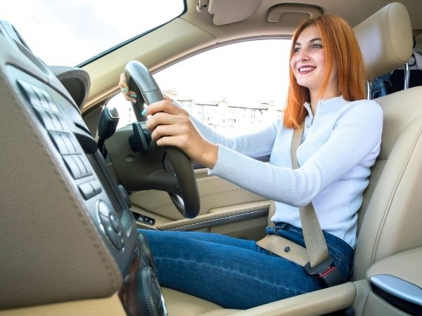 Woman Driving a Car