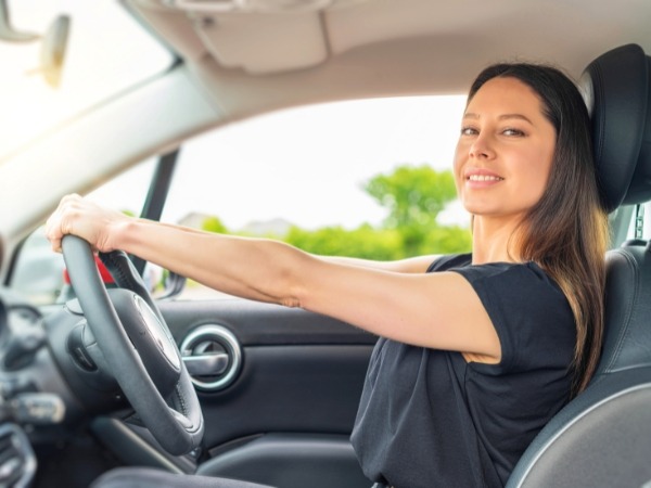 Woman Driving a Car