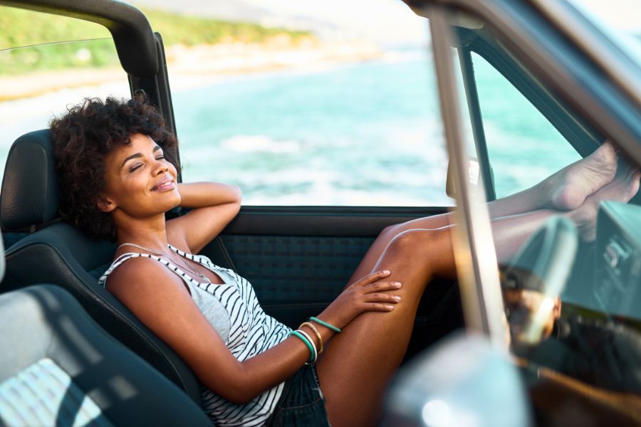 Woman with a Car in Nature