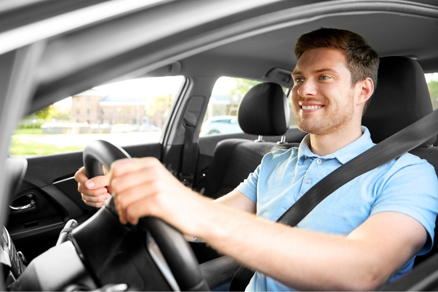 Man Driving a Car