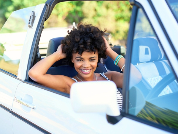 Woman with a Car in Nature