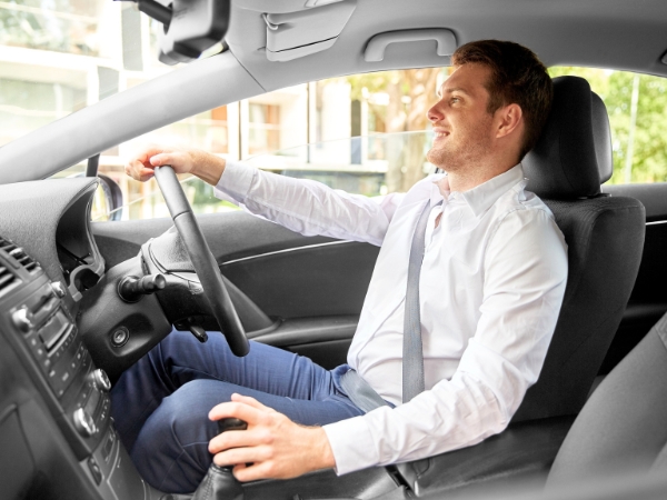 Man Driving a Car